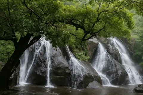 Five Falls (Aintharuvi) in Courtallam - tourist attraction to visit with Karthi Travels