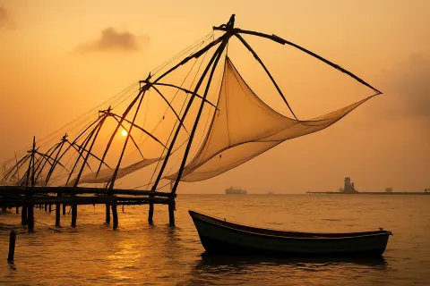 Chinese Fishing Nets in Kochi - tourist attraction to visit with Karthi Travels